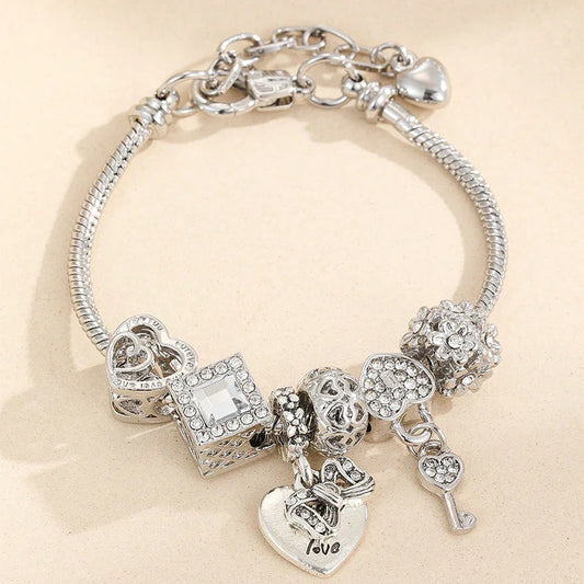Silver Hear and Bow Charm Bracelet